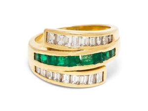 An 18 Karat Yellow Gold, Emerald and Diamond Ring