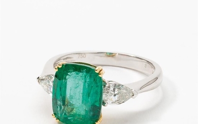 An 18 carat white and yellow gold, emerald...