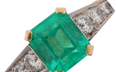 An 18ct gold Colombian emerald and diamond ring, centrally c...
