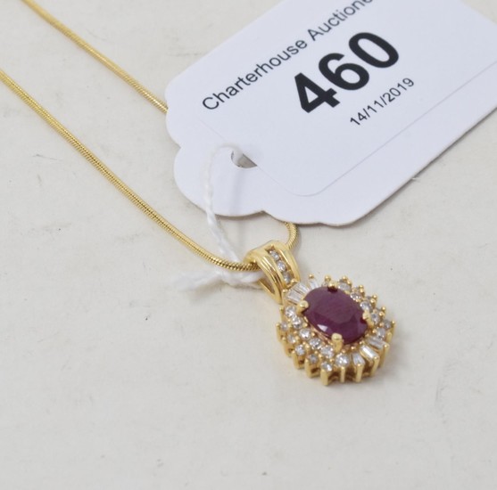 An 18ct gold, ruby and diamond pendant, on a chain