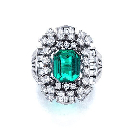 An Emerald, Diamond, and Platinum Ring