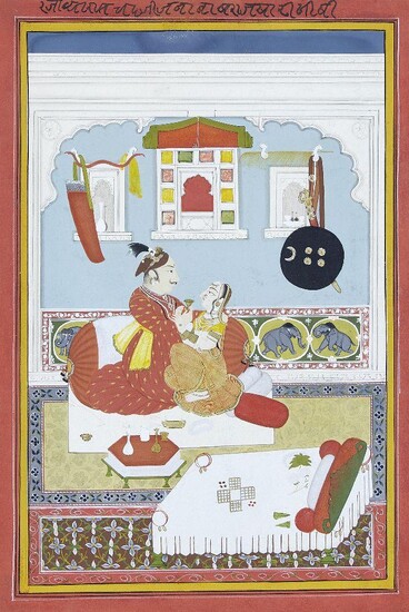 An amorous couple seated in their bedroom, Mewar, Udaipur, India, early 19th century, opaque pigments heightened with gilt on paper, the noble's shield, sword, bows and arrows hang on the wall, while the couple drink wine seated on cushions, single...