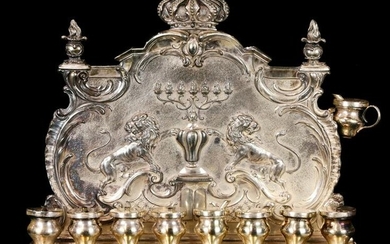 An antique Judaica silver plate Hanukkah oil lamp