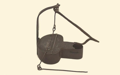 An early 19th century Pennsylvania iron betty lamp
