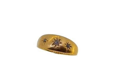 An early 20th century 18ct gold three stone ring