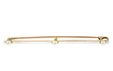 An early 20th century platinum and gold seed pearl bar brooch.