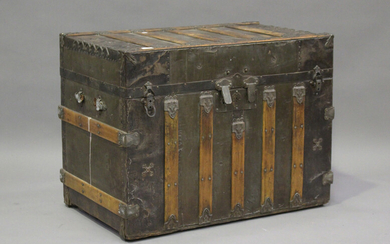 An early/mid-20th century American metal bound travelling trunk, height 65cm, width 87cm, depth 53cm