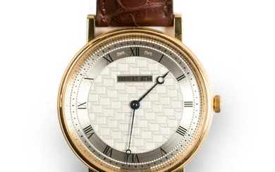 An eighteen karat gold wristwatch, Classique, Breguet