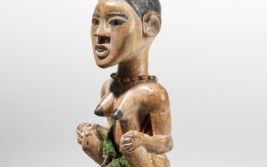 An expressive female Bakongo figure.