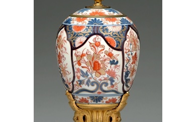 An ormolu mounted Imari jar and cover, Edo period, 18th c, ...