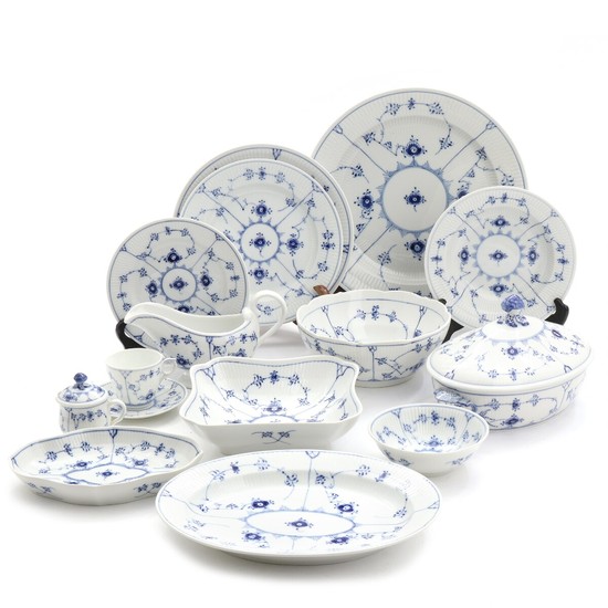 “Blue Fluted Plain”. Royal Copenhagen porcelain dinner and coffee set decorated in underglaze blue, comprising 37 pieces. (37)
