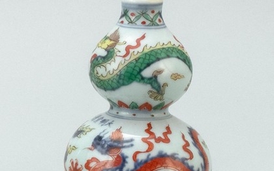 CHINESE DOUCAI PORCELAIN DOUBLE GOURD VASE Decorated with five-clawed dragons chasing fiery pearls. Blue six-character Xuande mark a...