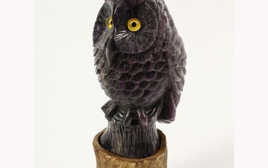 Carved Amethyst Figure of an Owl on Gilt Wood Base.