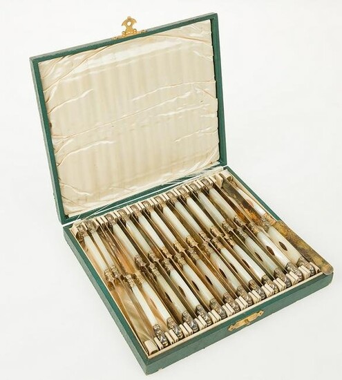 Case with 24 dessert knives. French silver