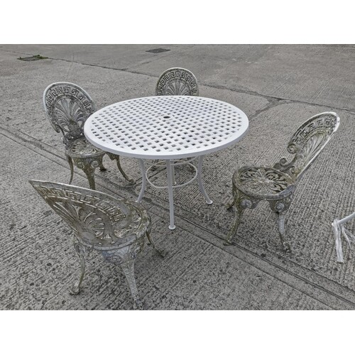 Cast iron garden table {71 cm H x 105 cm Dia.}and four match...