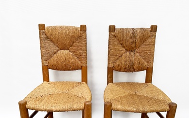 Charlotte PERRIAND Deux chaises à assise paillée et structure en bois. 86,5 x 42 x...