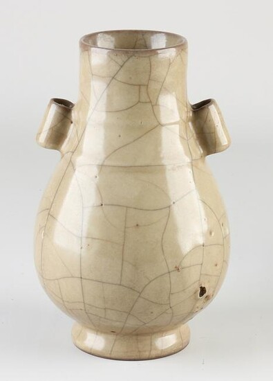 Chinese celadon vase with ears, H 18.6 cm.