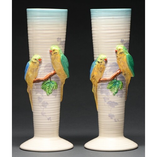 Clarice Cliff. A pair of A J Wilkinson Lovebirds vases, 1937...