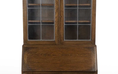 Cotswold School Oak secretaire bookcase, with leaded and glazed to...