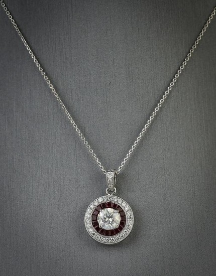 Diamond, ruby, and platinum pendant necklace