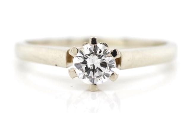 Diamond solitaire and 14ct white gold ring marked 585 WB. Ap...