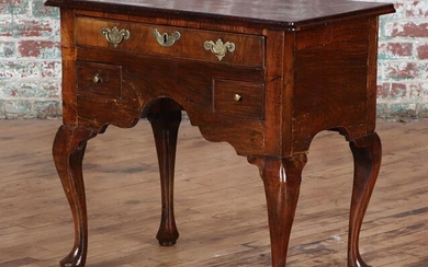 EARLY 19TH C. CONTINENTAL OLIVE WOOD LOWBOY
