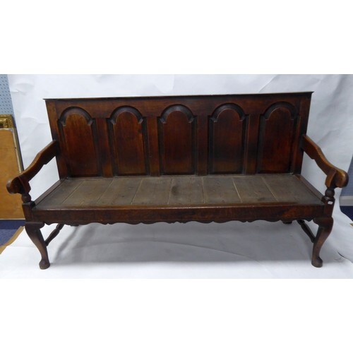 EARLY NINETEENTH CENTURY OAK SETTLE, of typical form with fi...