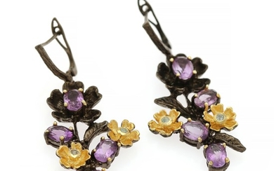 Ear pendants each set with four oval-cut amethysts and two circular-cut topazes, mounted in black rhodiumplated and partly gilded sterling silver. (2)