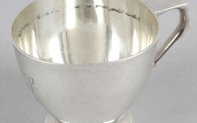 An early 20th century silver christening mug.