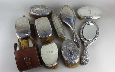 Four pairs of early 20th century silver backed hair brushes