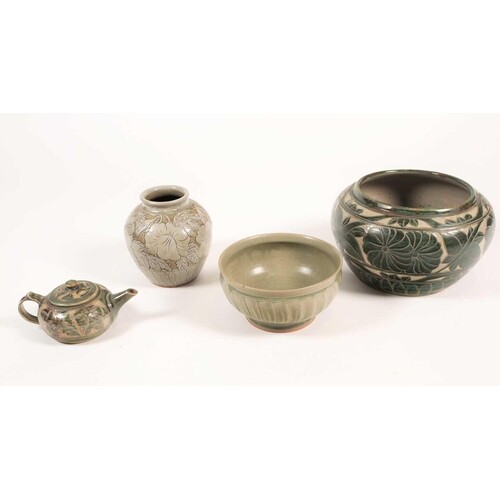 Four pieces of British studio pottery, comprising a jardinie...