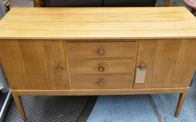 GORDON RUSSELL SIDEBOARD, 1970's walnut with three drawers flanked...