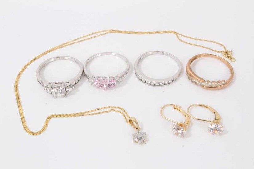 Group of 14ct gold to include three white gold gem set dress rings, rose gold gem set dress ring, pair gem set earrings and necklace