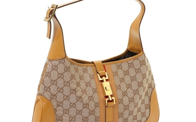 NOT SOLD. Gucci: A "Mini Jackie" bag of beige golden canvas with one large compartment...