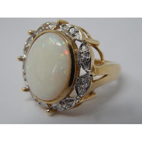 HUGE Opal Ring Set with a Central Opal Measuring 16mm x 12mm...