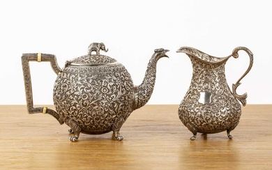 Indian Cutch teapot and similar jug late 19th Century both...