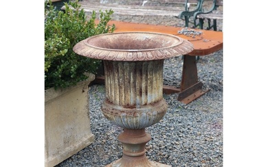 Large antique French cast iron fluted garden urn, with egg a...