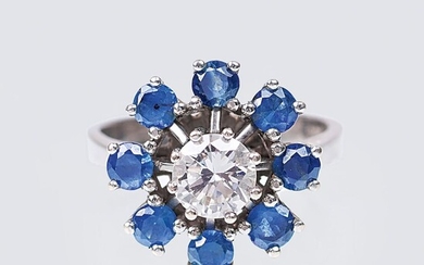 A Solitaire Diamond Ring with Sapphires