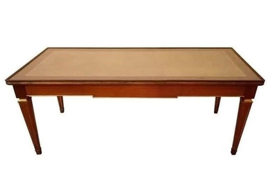 Louis XV style Jansen style coffee table. A mahogany glass top over leather tooled top in the