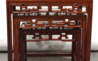 Nest of three Chinese hardwood tables, mother of pearl inlaid, and a barrel seat