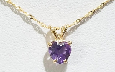 New 14K yellow gold necklace and pendant inlaid with a heart-shaped natural amethyst stone....