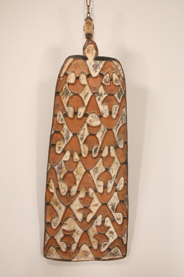 PNG, Asmat, war shield, rectangular shaped with anthropomorphic figure on top, the fngers on the...