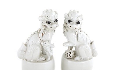 Pair Chinese Blanc De Chine Porcelain Foo Lion Figures