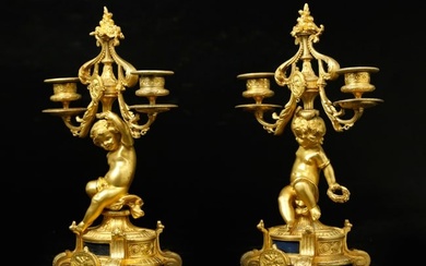 Pair of 19th century French Dore bronze cupid 2 arm candelabras