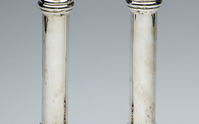 Pair of Australian sterling silver column candlesticks with loaded bases,...