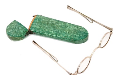 Pair of George III silver framed spectacles in a green shagreen spectacle case