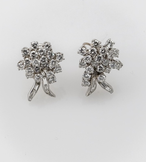 Pair of Platinum, 14-Karat White-Gold and Diamond French Clip-Back Pierced Earrings, Total weight of diamonds: 5 carats; Total gross weight: 8.8 dwt; Length: 1 in (2.5 cm)