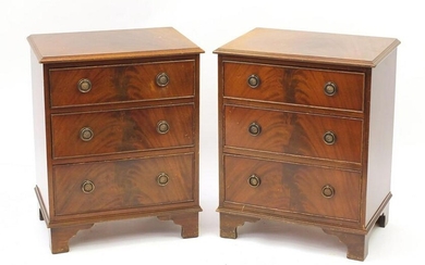 Pair of mahogany three drawer chests with brass ring