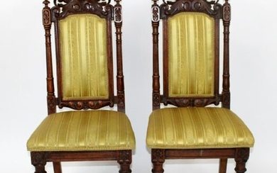 Pair of pierce carved oak side chairs
