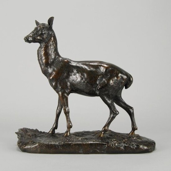Paul Comolera (French, 1818 ~ 1897) An animalier bronze study of a standing doe, signed & dated. Circa 1867. Height 32 cm, Width 34cm
